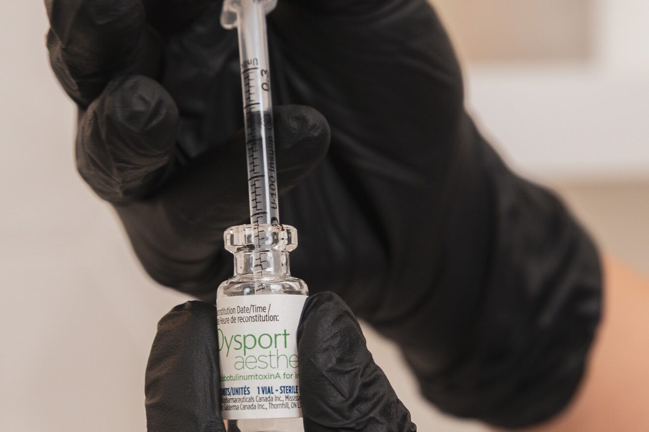 A Worthy provider prepares a syringe for a patient's Dysport in Kitchener.